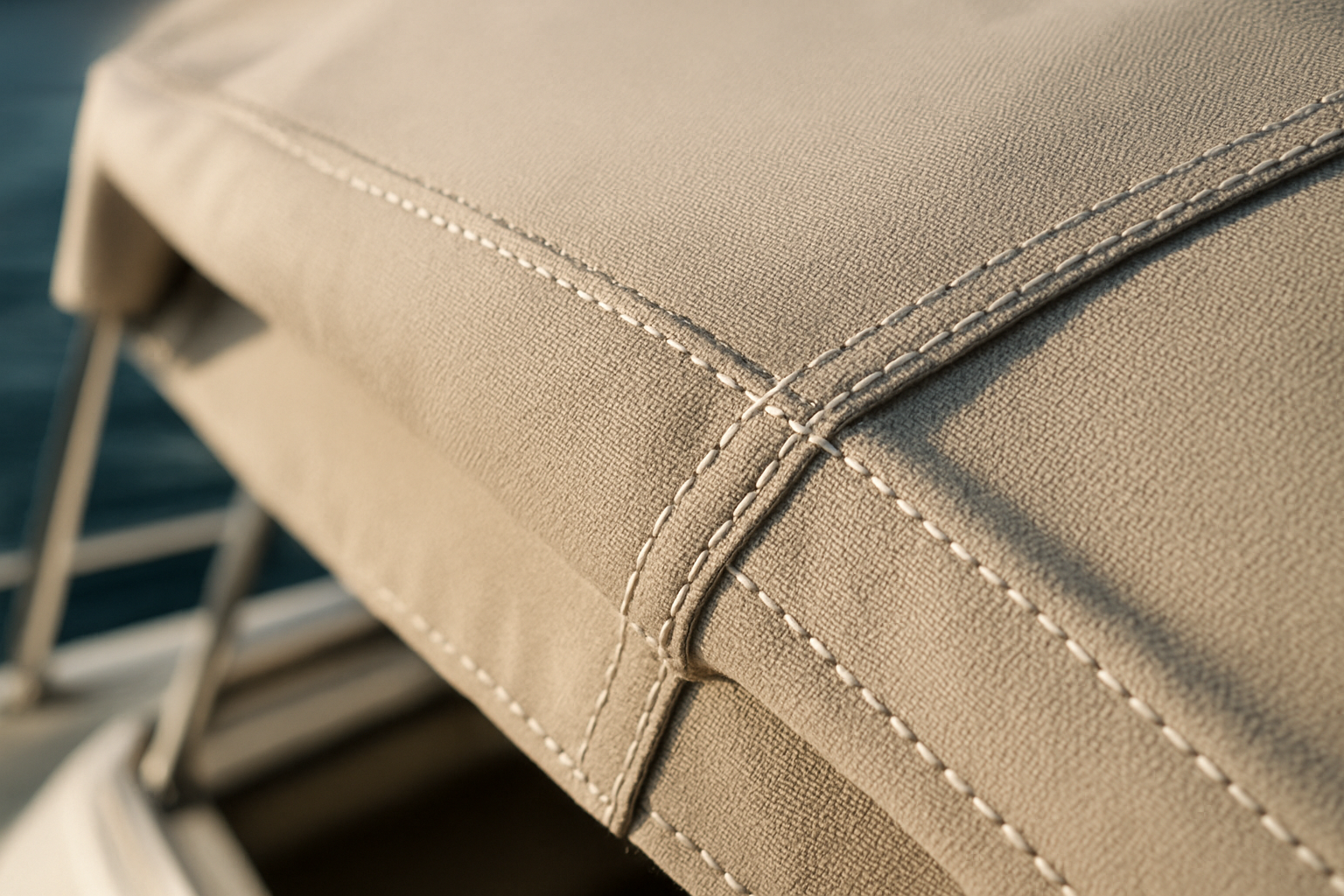 Close-up of marine canvas and stitching on boat cover